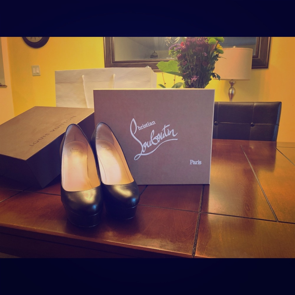 Louboutin black heels size 7.5